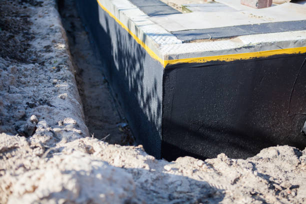 Professional Basement Waterproofing technician working in Hatboro, PA